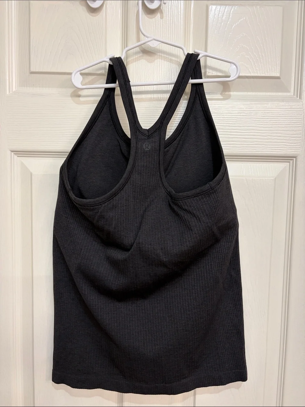 047. Lululemon Ebb To Street Tank II Black size 10 with pads